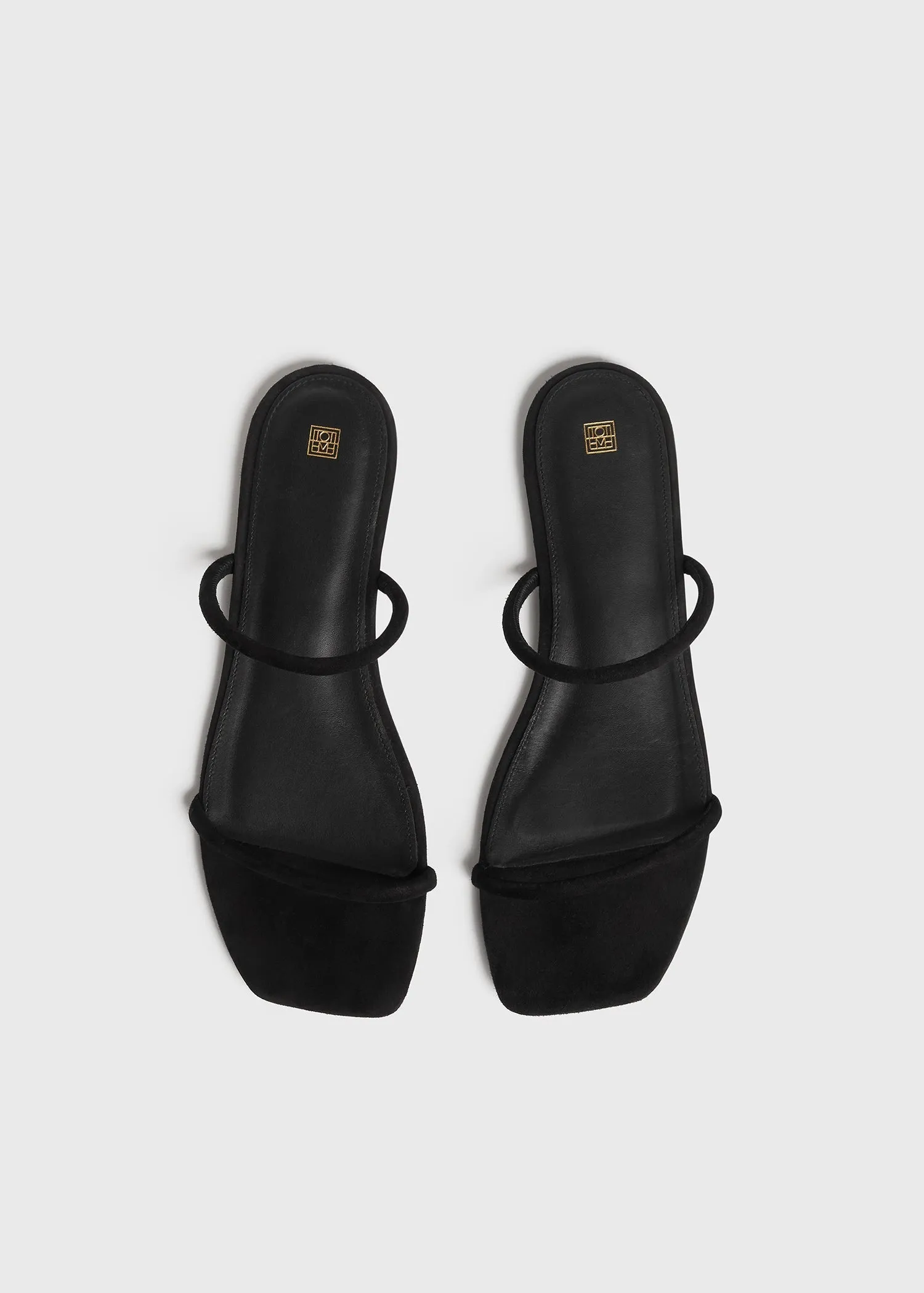 Minimalist suede slides black sold by Toteme product image thumbnail 5