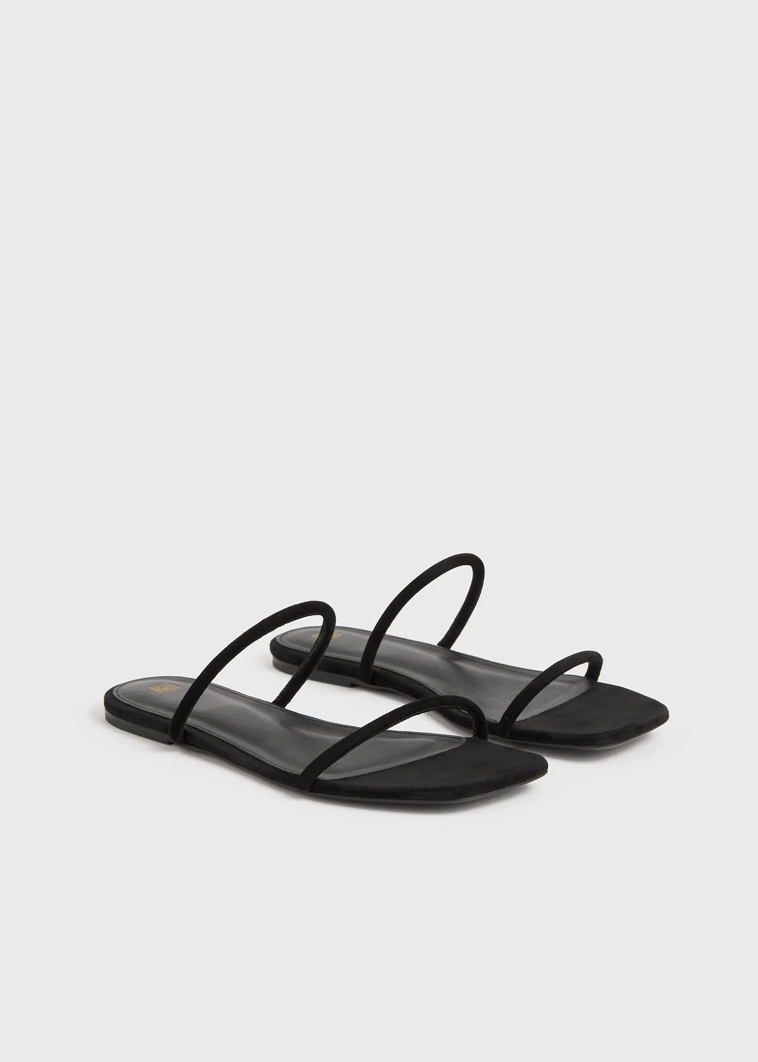 Minimalist suede slides black sold by Toteme product image thumbnail 2