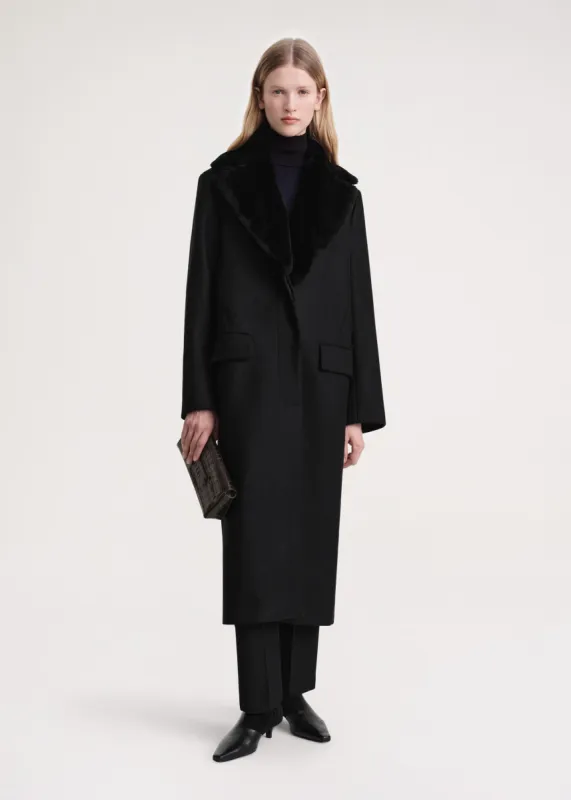 Shearling-collar coat black sold by Toteme