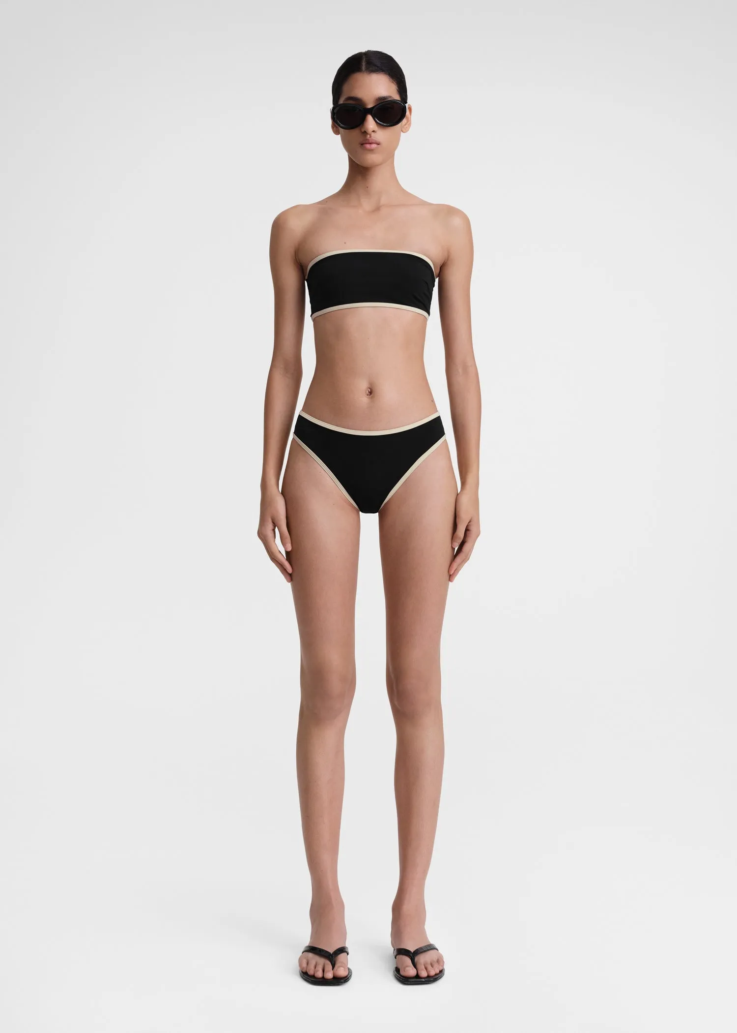 Stripe edge bikini bottoms black sold by Toteme