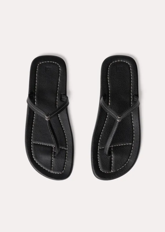 The T-Strap Sandal black grain sold by Toteme