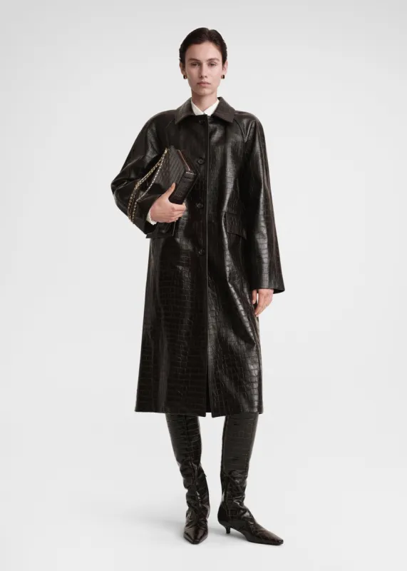 Raglan-sleeve croco embossed coat dark brown sold by Toteme