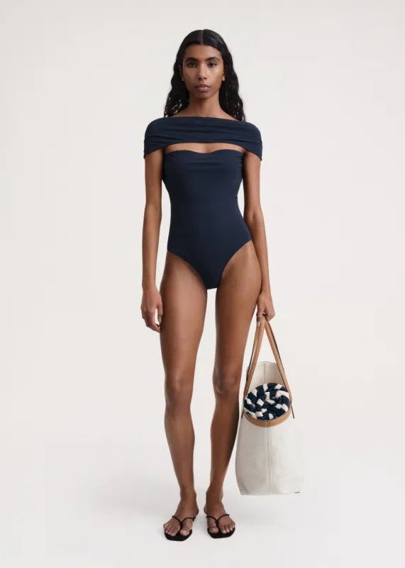 Slip-through swimsuit dark navy sold by Toteme