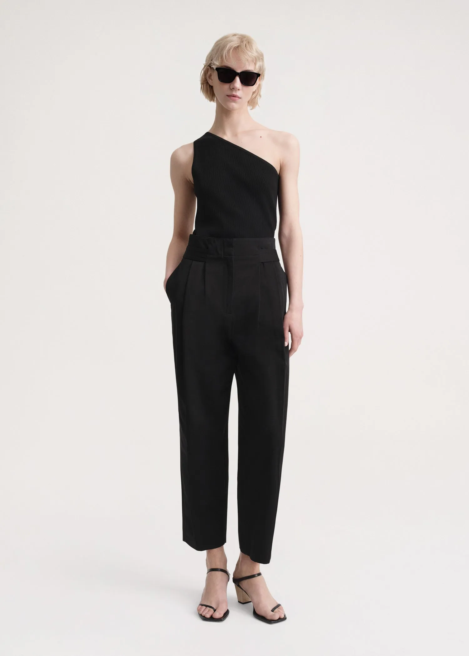 Double-Pleated trousers black sold by Toteme