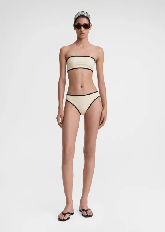 Stripe edge bikini bottoms light hay sold by Toteme