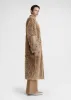 Curly shearling coat biscuit sold by Toteme