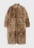 Curly shearling coat biscuit sold by Toteme