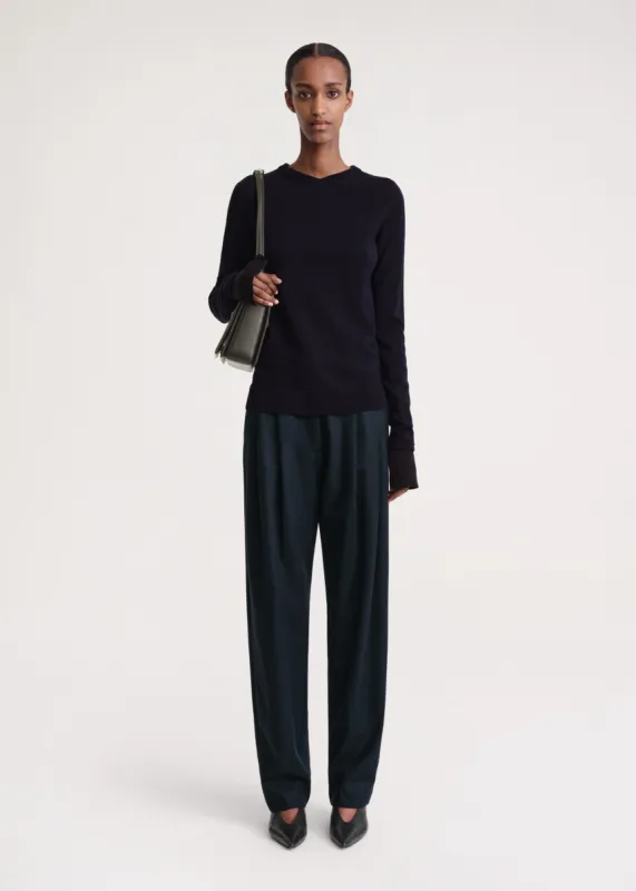 Two-tone V-neck knit navy sold by Toteme