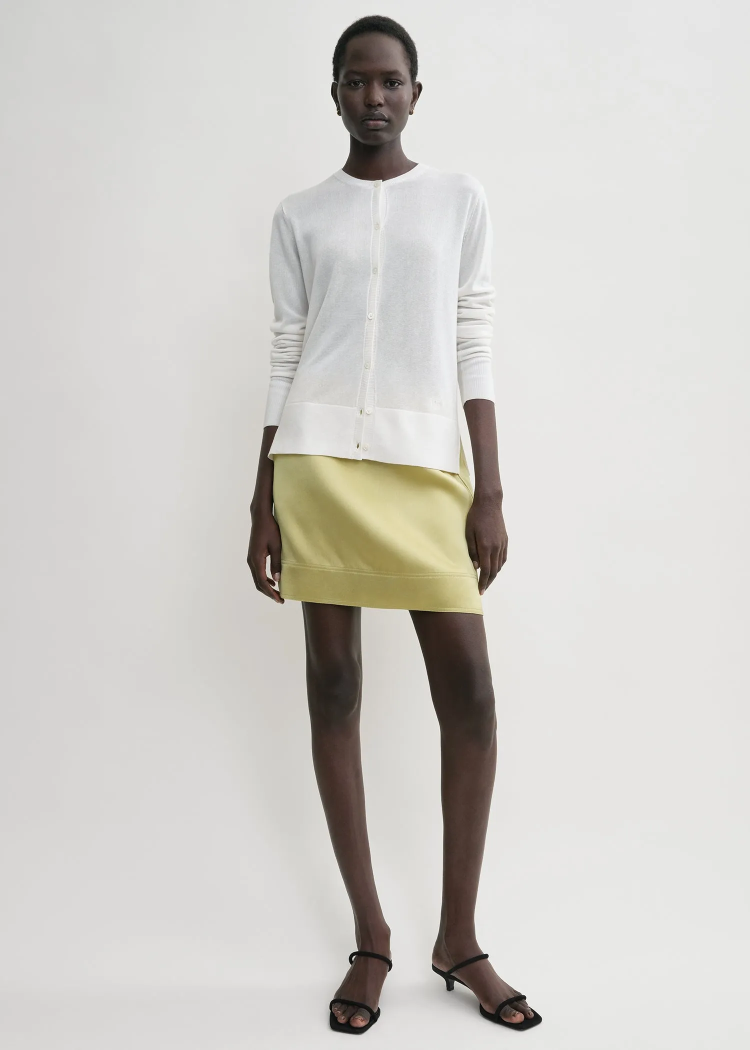 Contrast satin mini skirt melon sold by Toteme