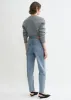 Tapered leg denim worn blue sold by Toteme