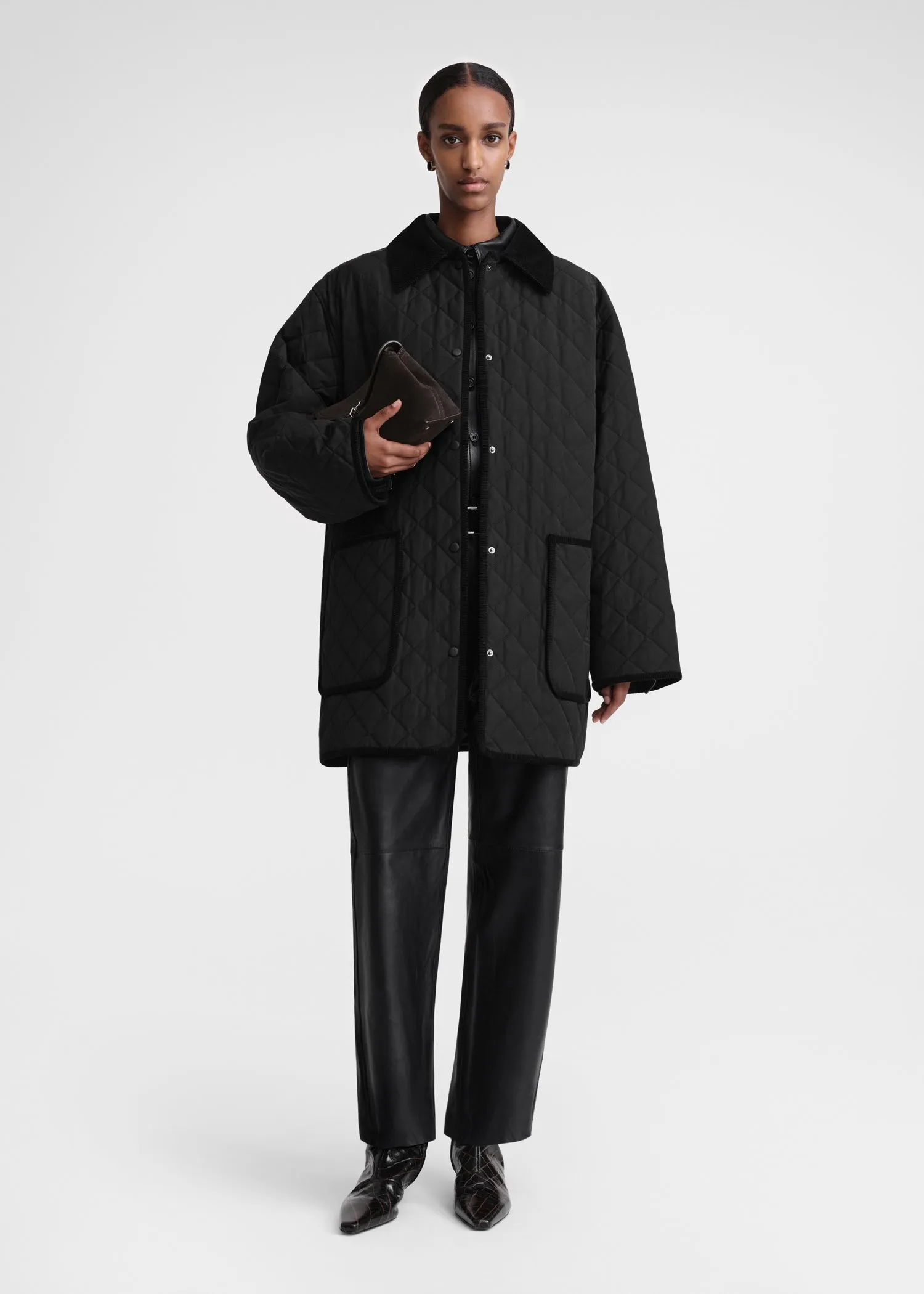 Quilted barn jacket black sold by Toteme