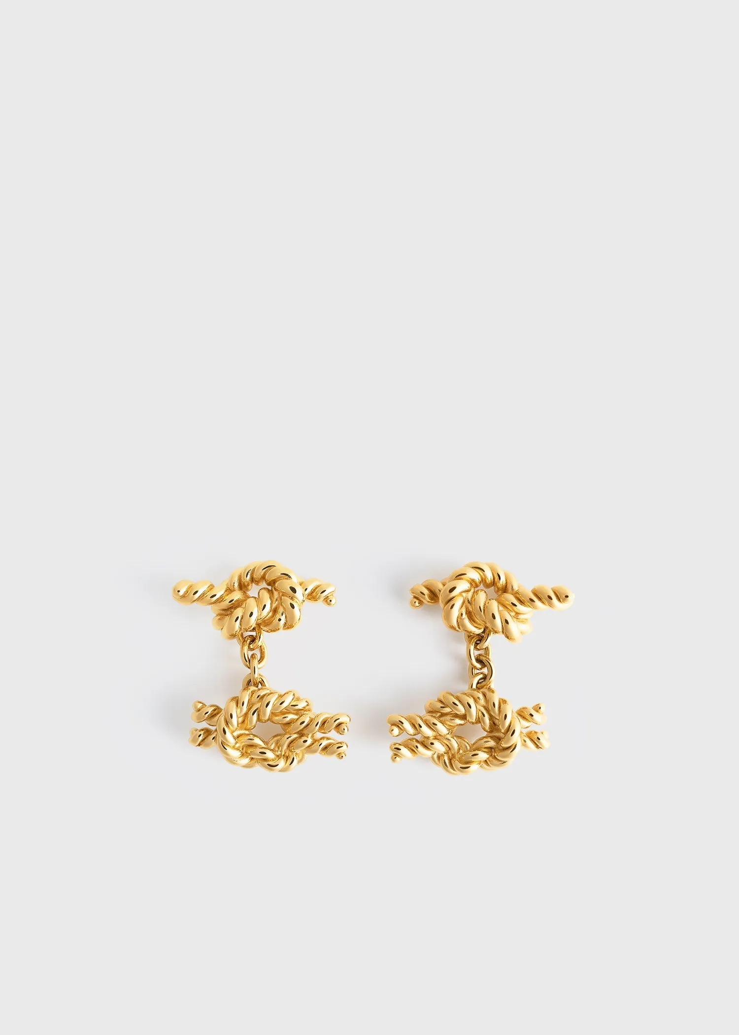 Rope knot earrings gold sold by Toteme