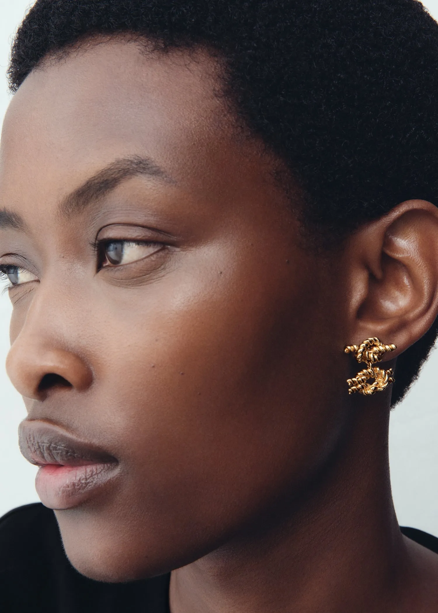 Rope knot earrings gold sold by Toteme product image thumbnail 2