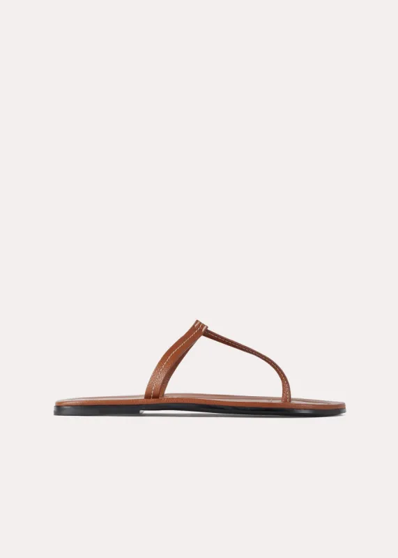 The T-Strap Sandal tan grain made by Toteme