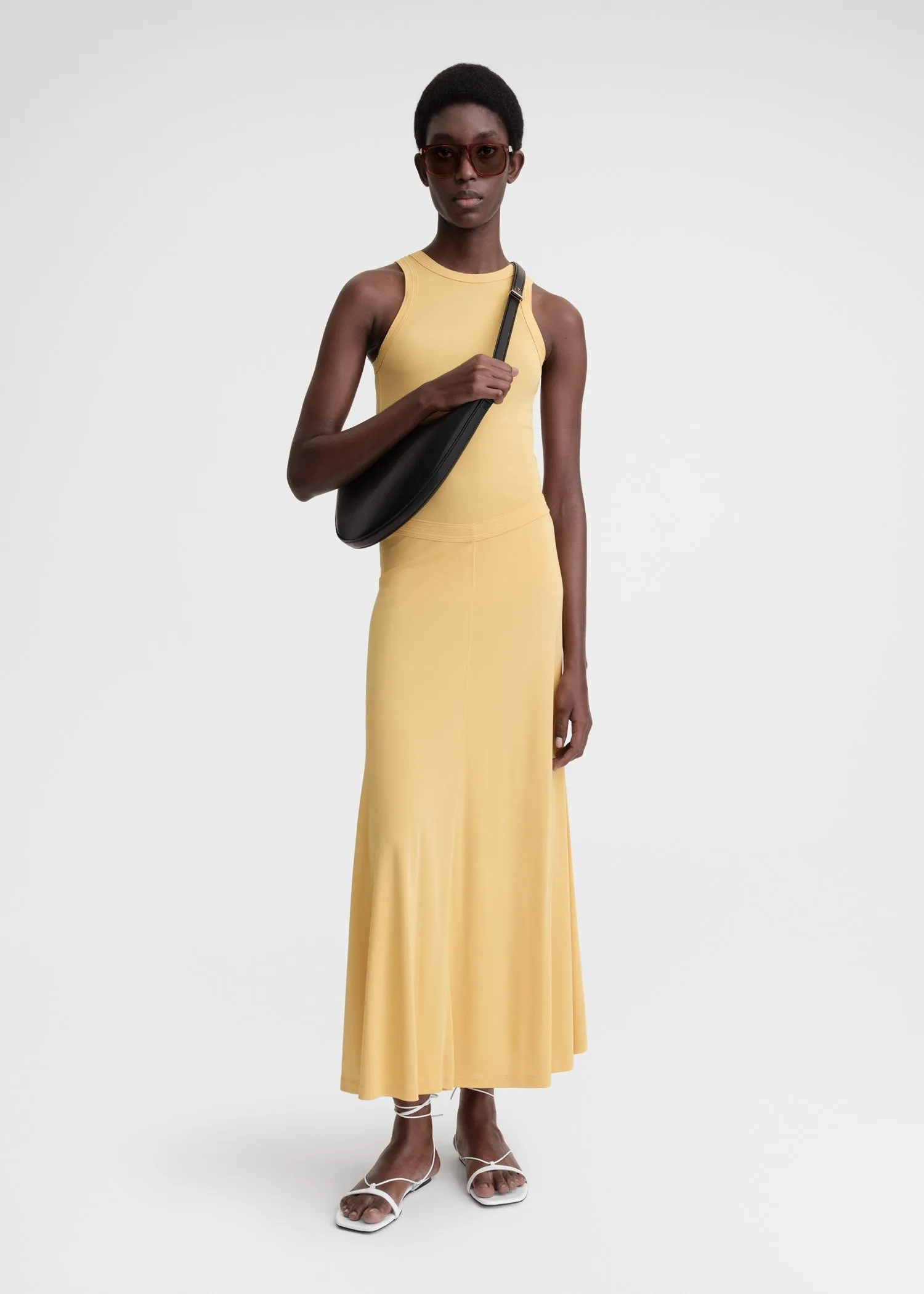 Fluid jersey skirt cornsilk sold by Toteme