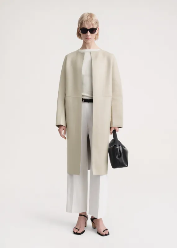 City leather coat eggshell made by Toteme