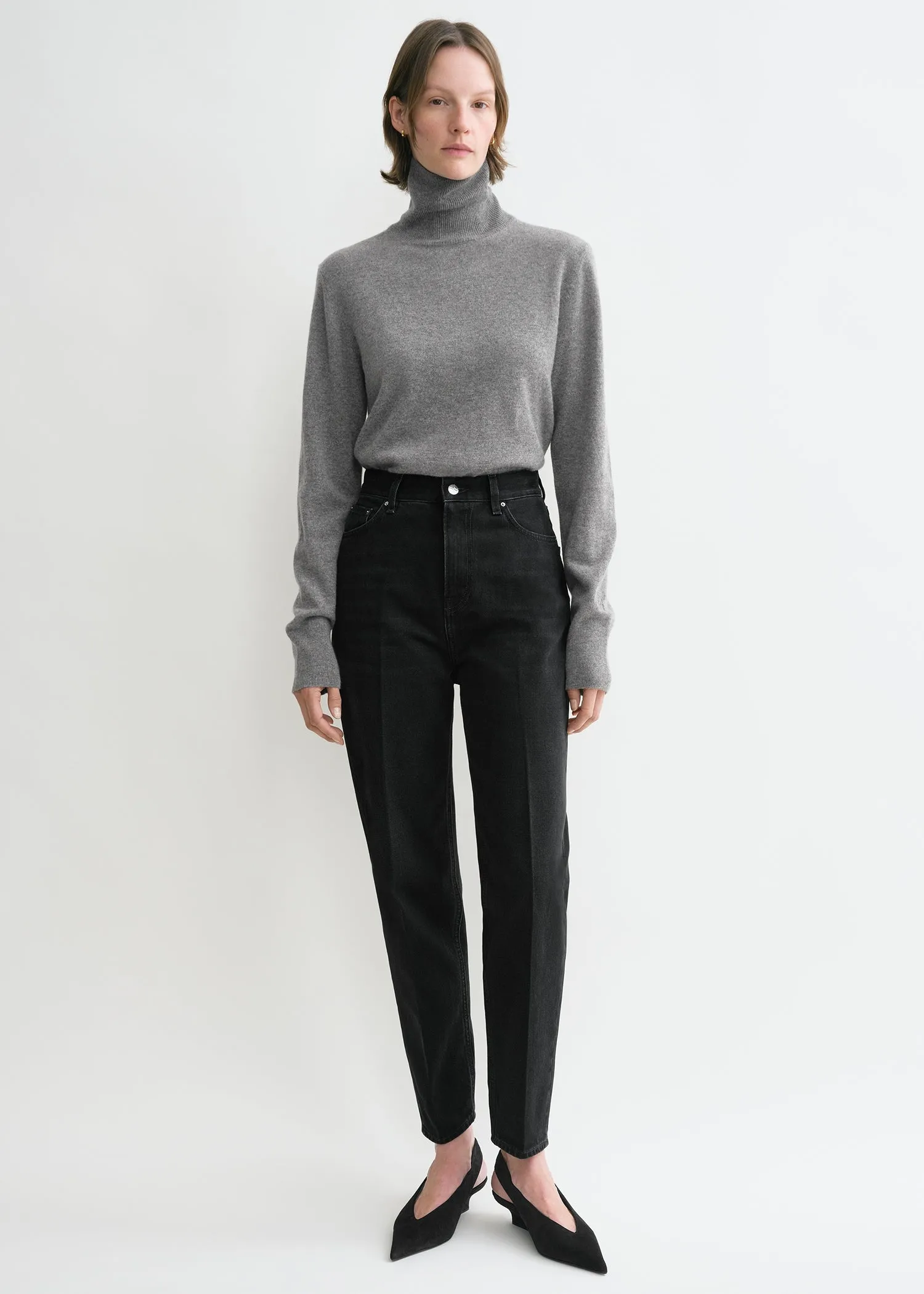 Tapered leg denim faded black sold by Toteme