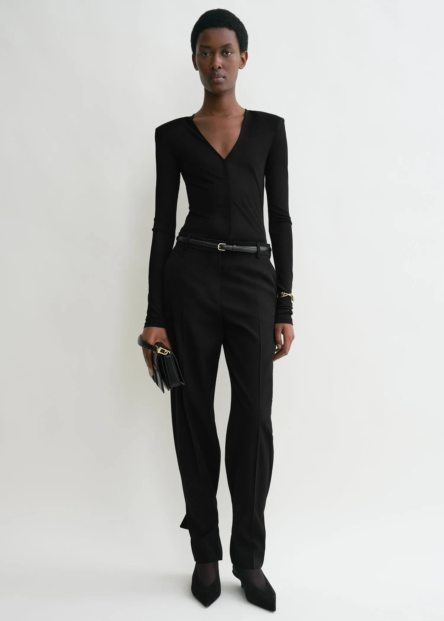 Deep V-neck top black sold by Toteme