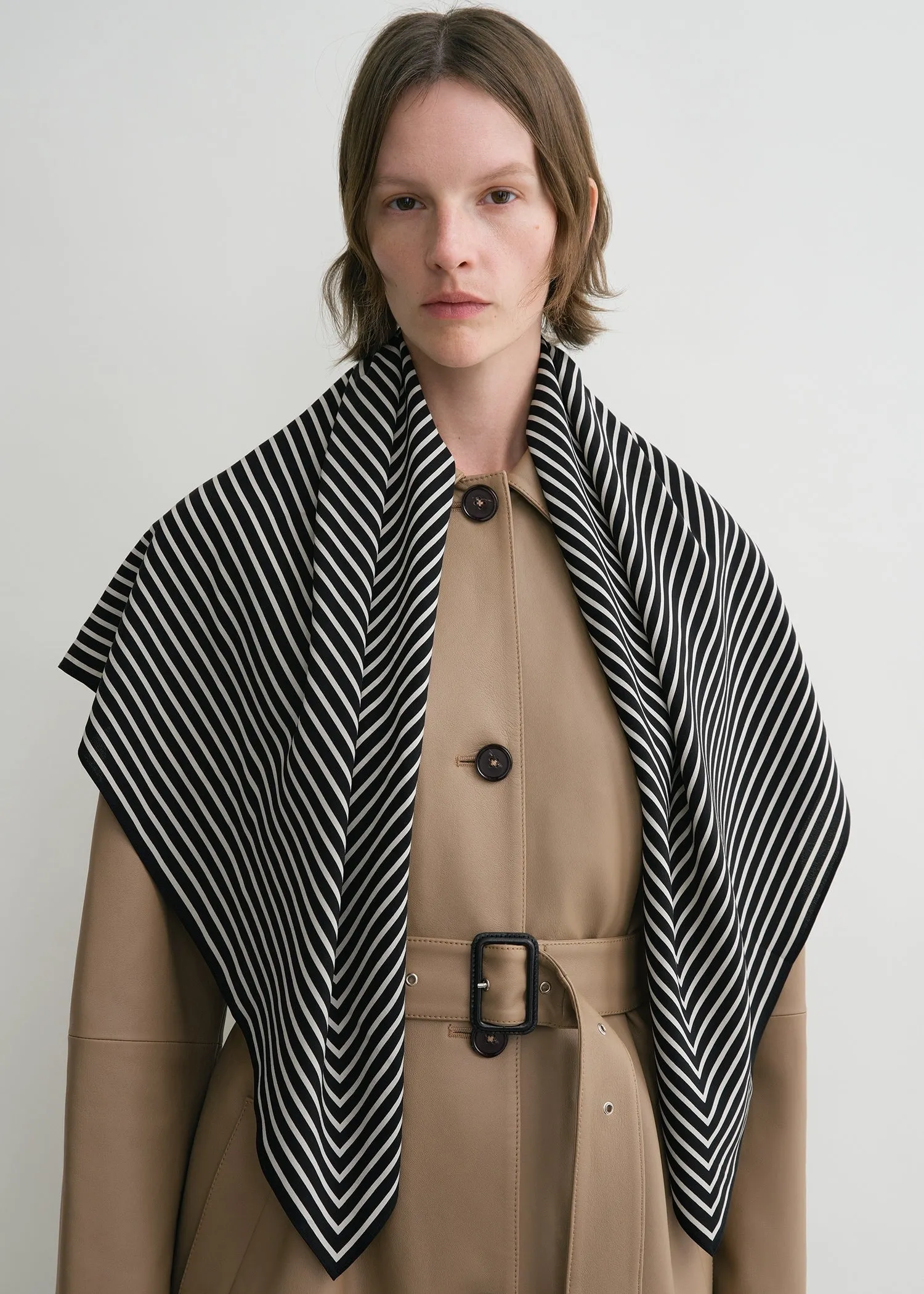 Signature monogram silk blanket scarf black sold by Toteme