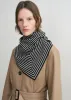 Signature monogram silk blanket scarf black sold by Toteme