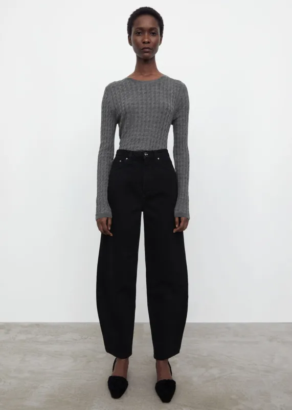 Barrel leg denim black sold by Toteme