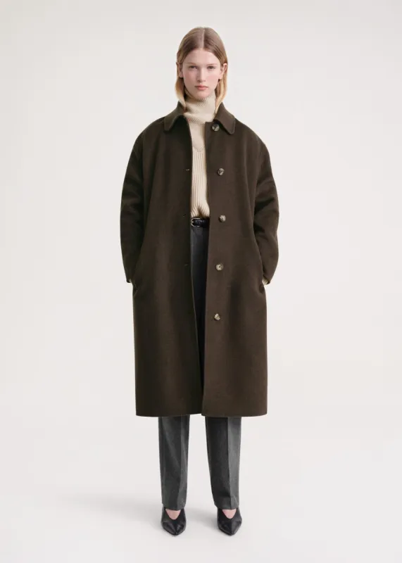 Doublé car coat chocolate mélange sold by Toteme