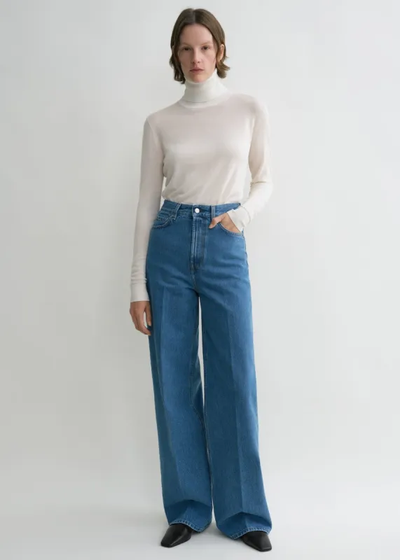Wide leg denim vibrant blue sold by Toteme
