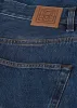 Wide tapered leg denim dark blue sold by Toteme