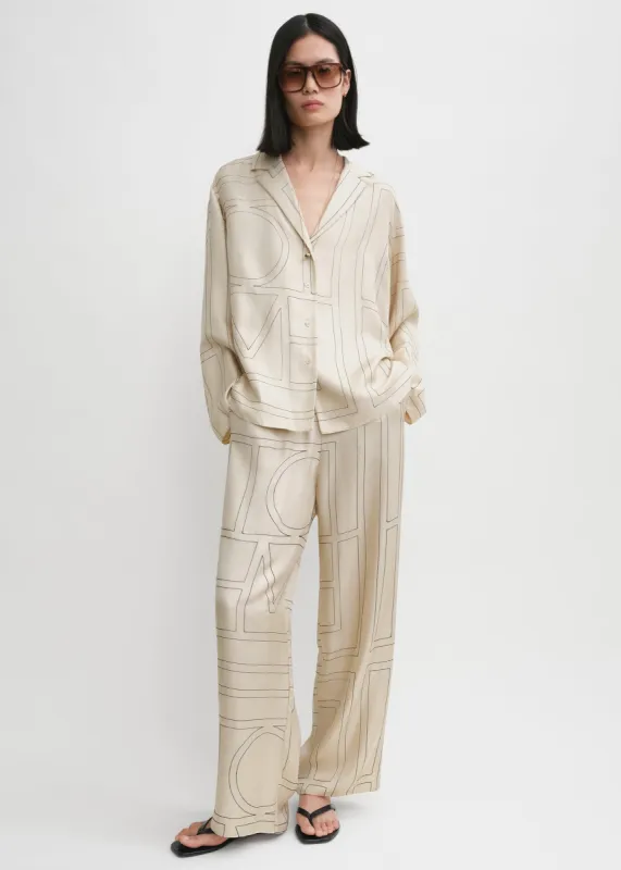 Monogram silk pj top ivory sold by Toteme