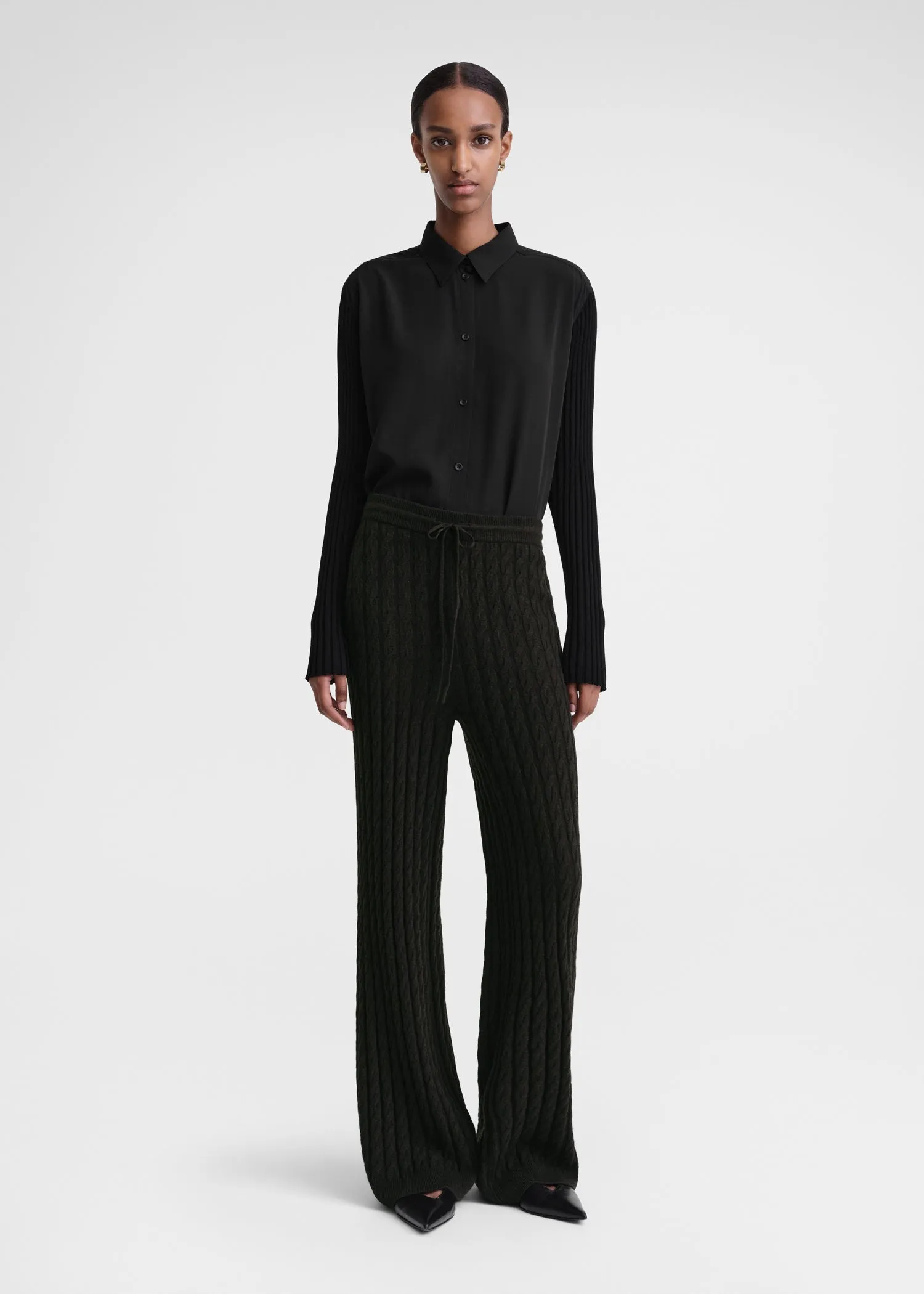 Cable knit trousers espresso sold by Toteme