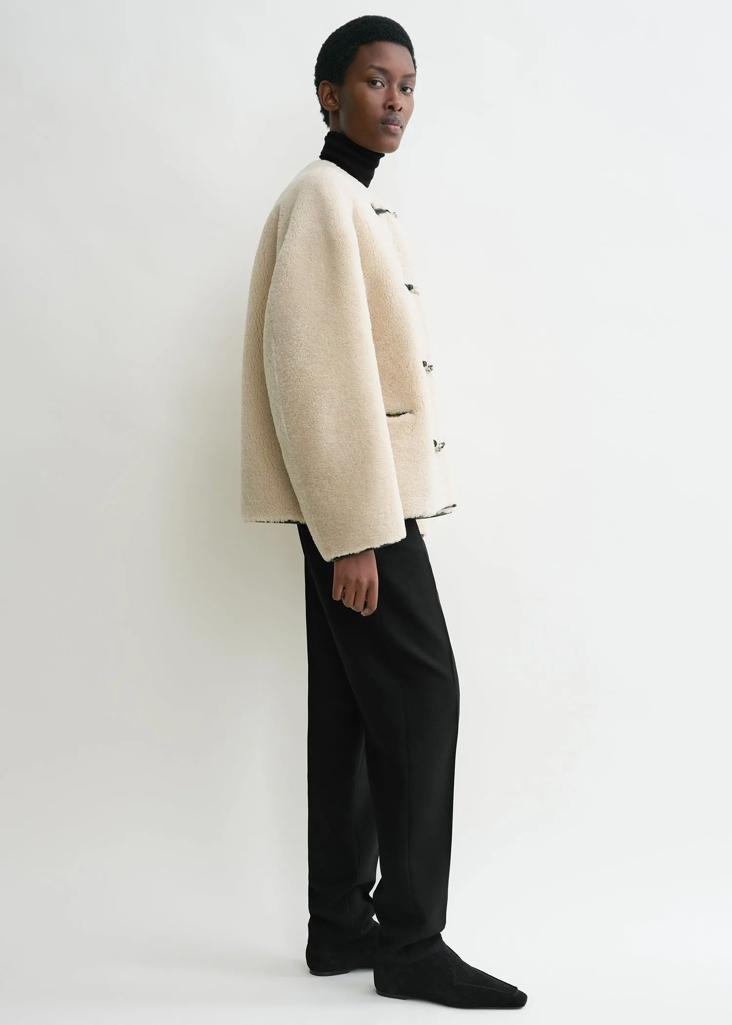 Teddy shearling clasp jacket off-white sold by Toteme