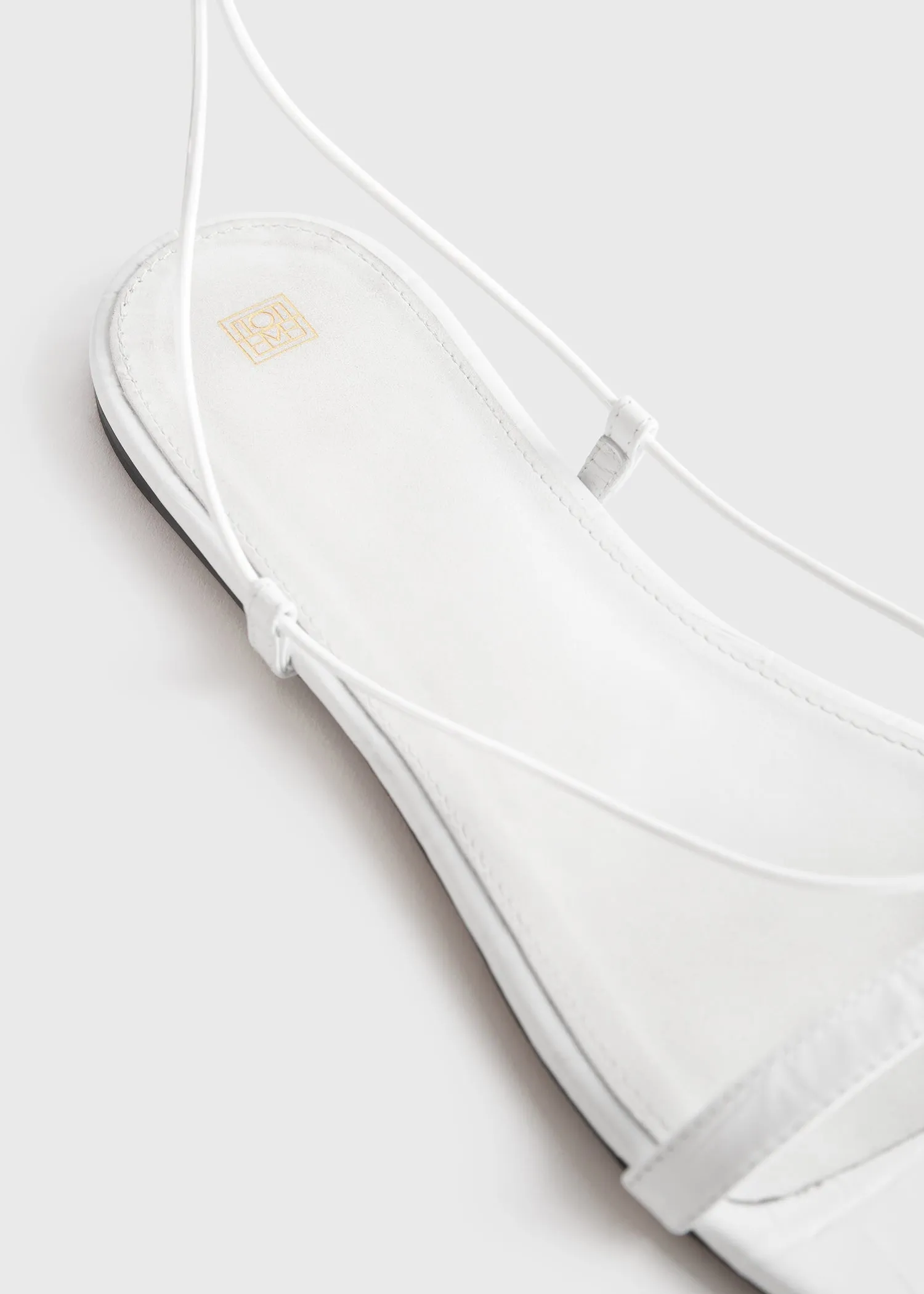 The Croco Tie Sandal white sold by Toteme product image thumbnail 5