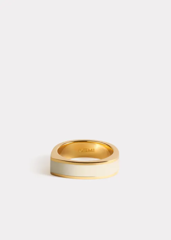 Signature ring ecru/gold sold by Toteme