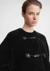 Teddy shearling clasp jacket black sold by Toteme