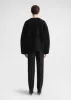 Teddy shearling clasp jacket black sold by Toteme