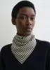 Signature monogram silk scarf crème sold by Toteme