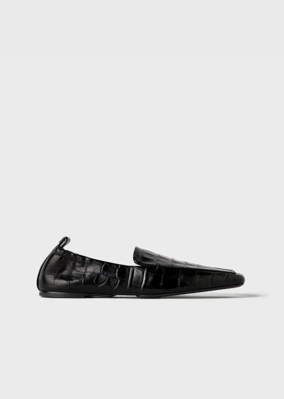 The Travel Loafer black croco sold by Toteme