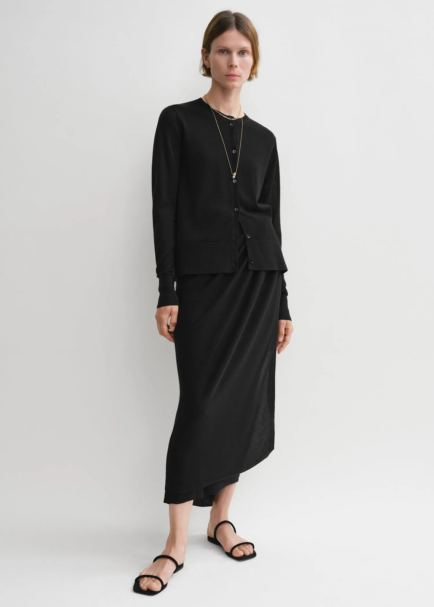 Fine knit cardigan black sold by Toteme