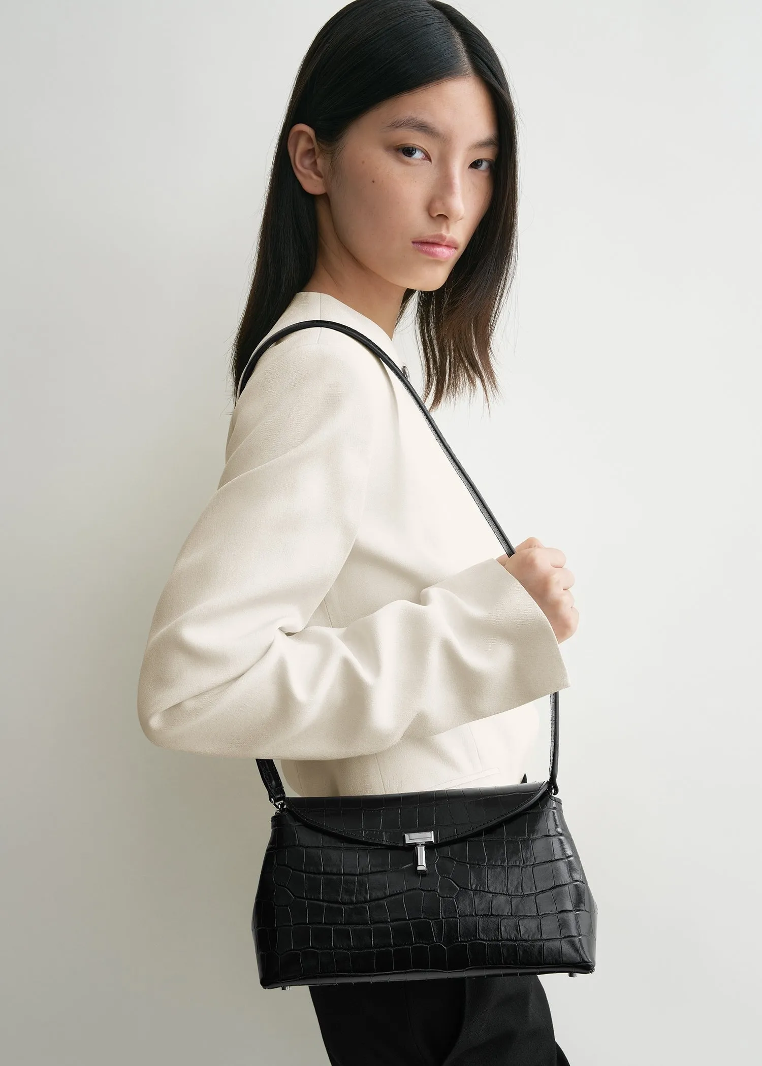 T-Lock croco-embossed clutch black sold by Toteme product image thumbnail 2