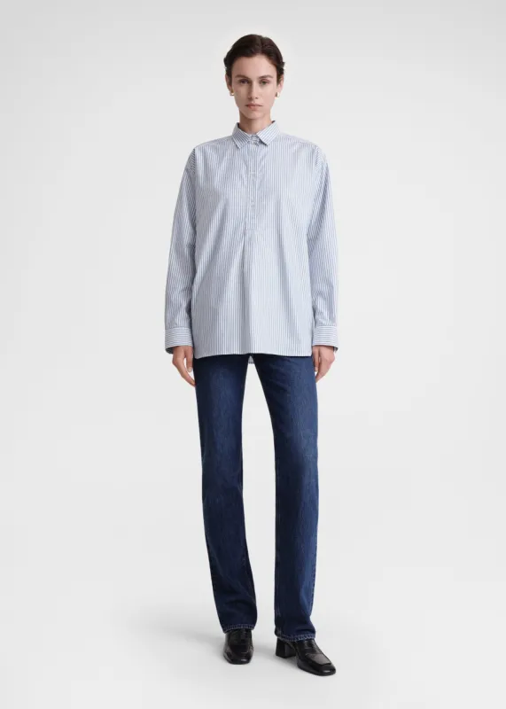 Striped half-placket shirt blue/white sold by Toteme