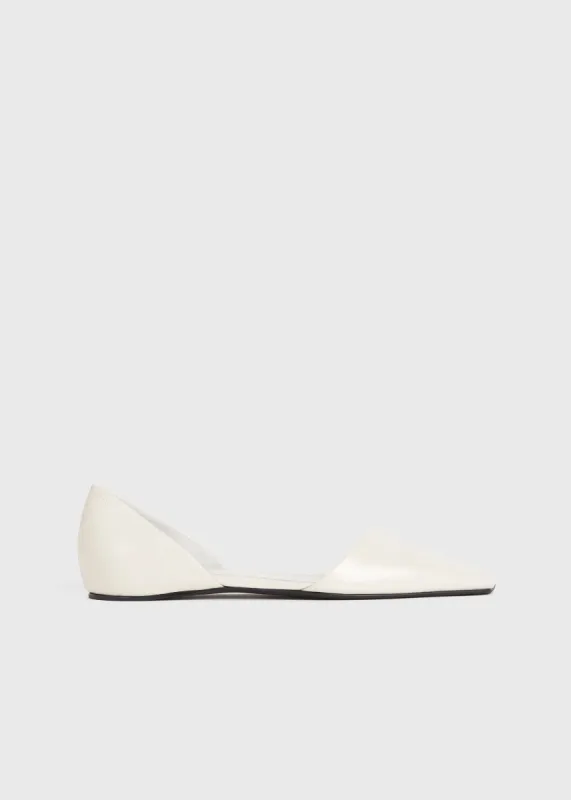 The Asymmetric D'Orsay Flat snow sold by Toteme