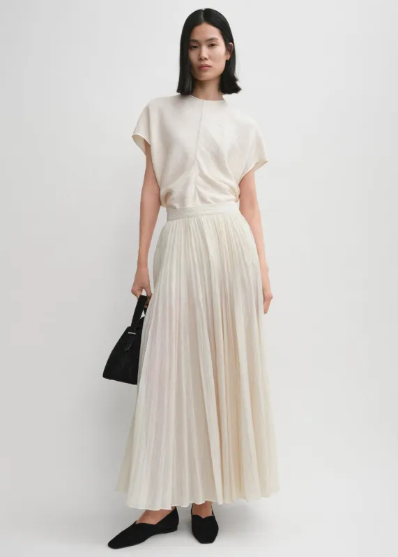 Crinkled plissé skirt meringue sold by Toteme