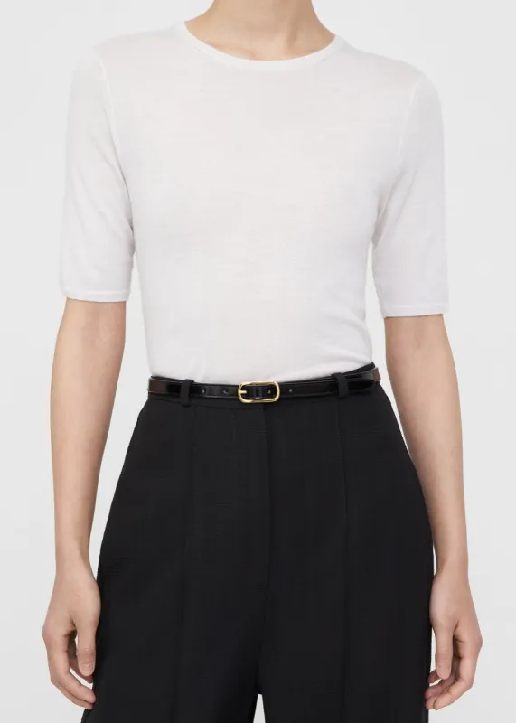 Slim oval buckle leather belt black sold by Toteme