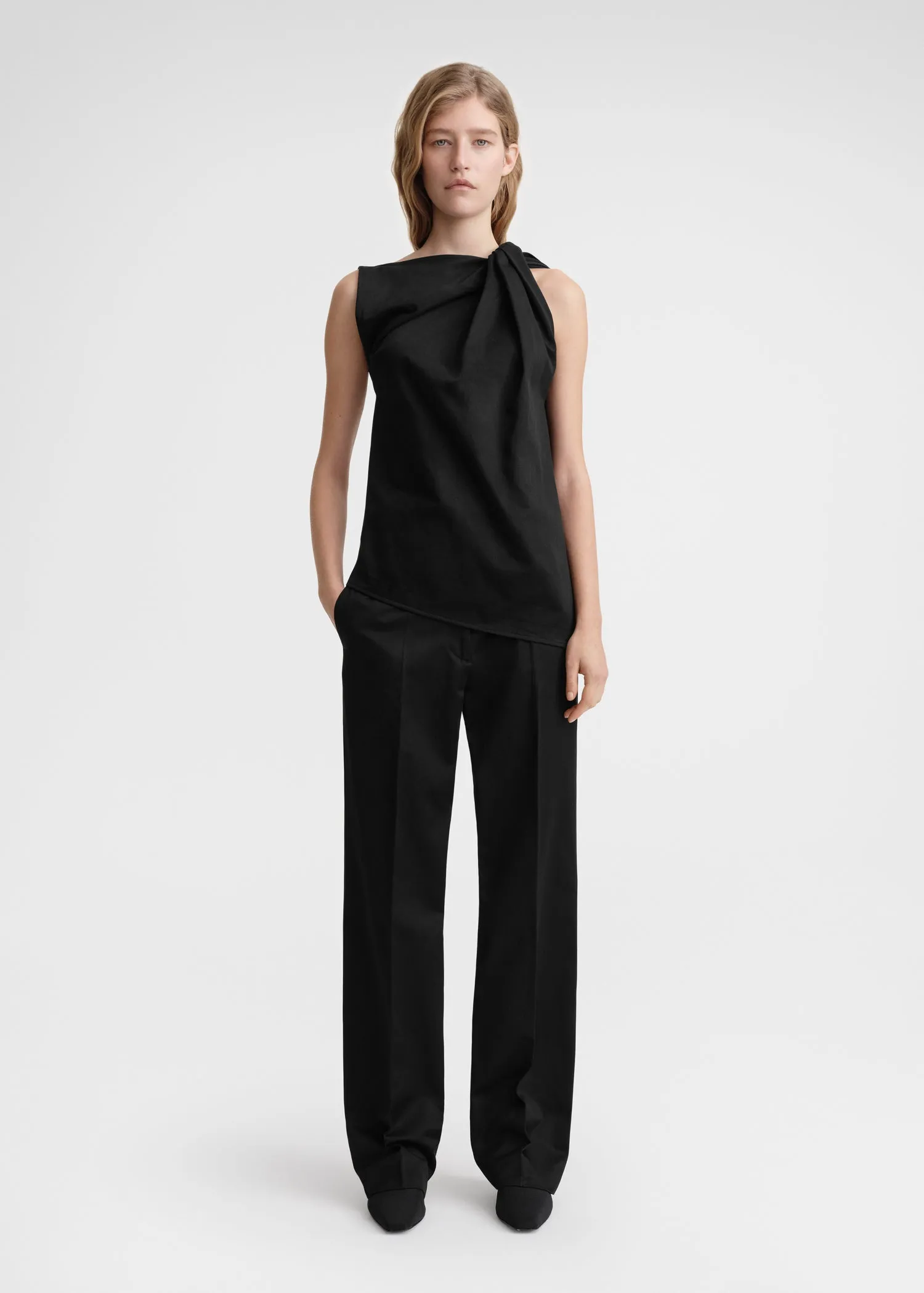 Shoulder-twist top black sold by Toteme