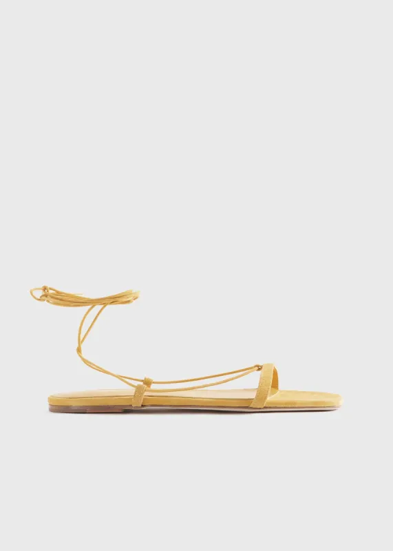 The Suede Tie Sandal cornsilk sold by Toteme