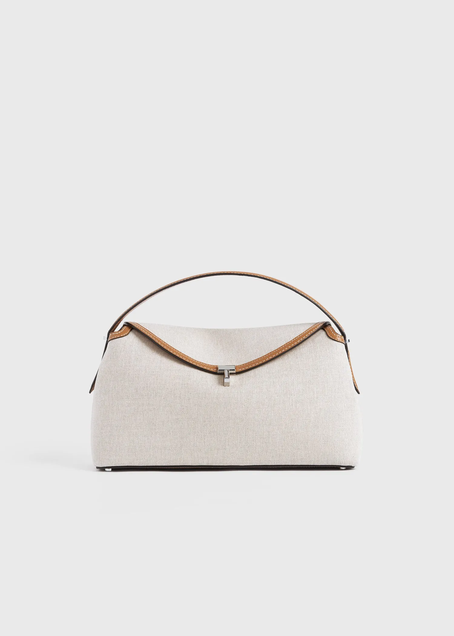 T-lock canvas top handle ecru/tan sold by Toteme