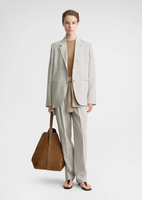 Tailored suit jacket oat melange sold by Toteme