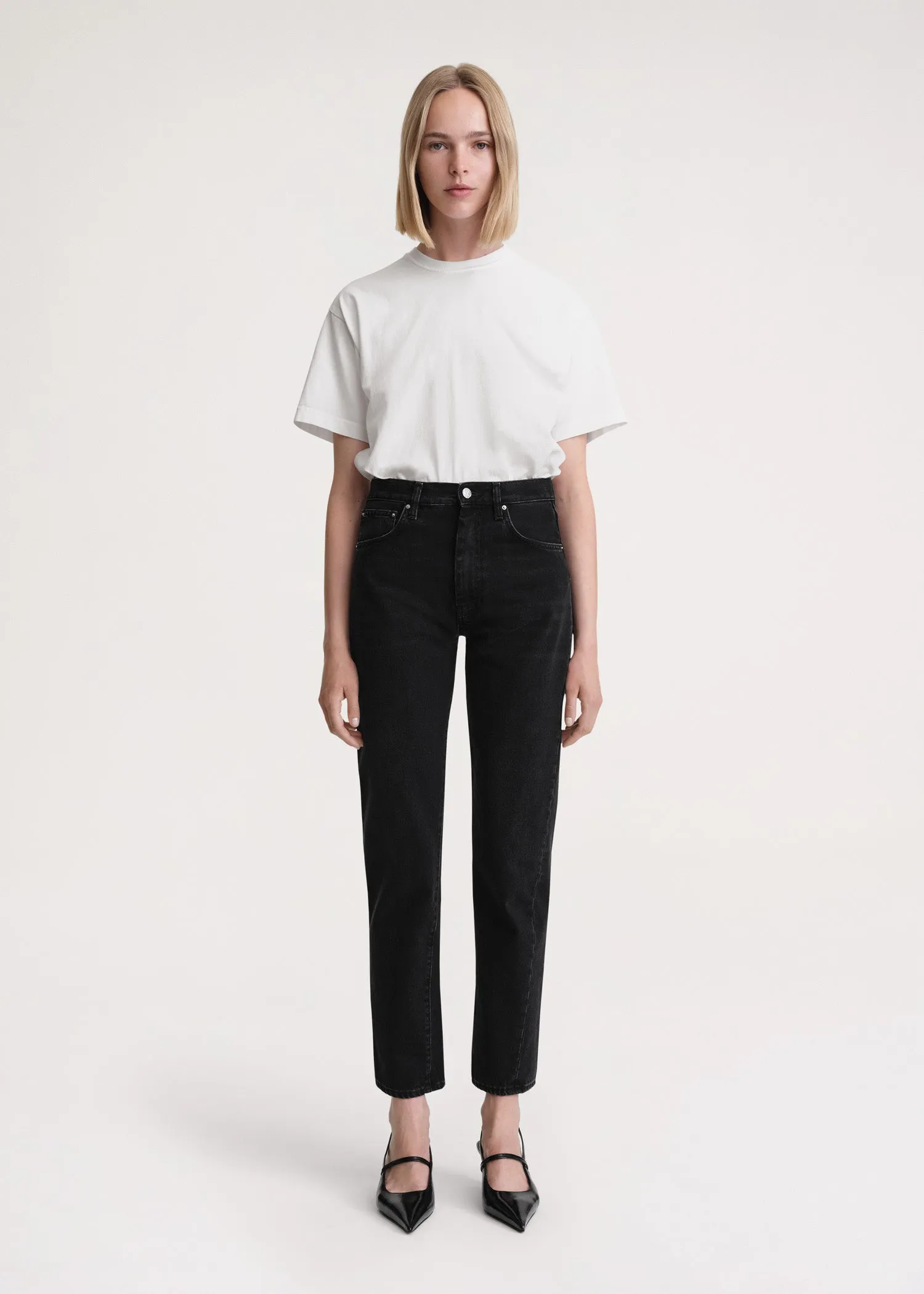 Twisted seam denim faded black sold by Toteme