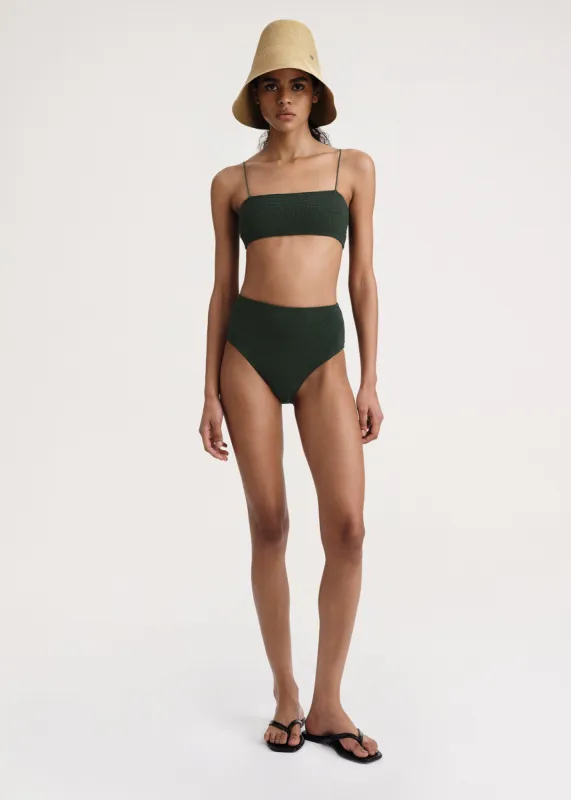 Smocked bikini bottoms dark green sold by Toteme