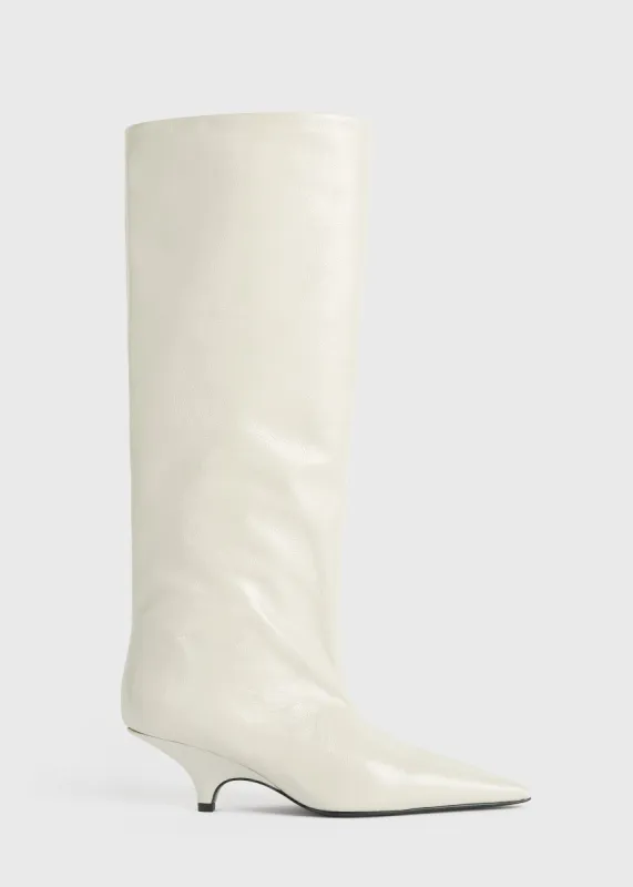 Wedge-heel Naplack boots bleached sand sold by Toteme
